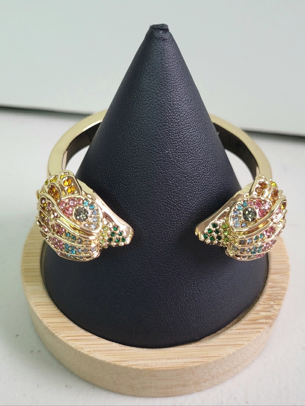 Kurt Geiger Double Eagle Head Hinge Bracelet Gold Tone With Rainbow Accents. NWT